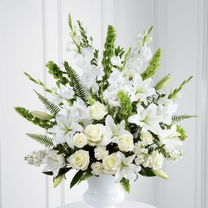 This stunning arrangement is a beautiful expression of peace and soft serenity. White roses