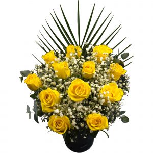 12 long stemmed Yellow Roses. Hand-wrapped in colour coordinated cellophane and tied with a matching handmade bow.
